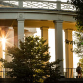 Wake Forest students enjoy a beautiful late summer morning as they walk across campus to class.