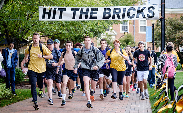 Students participate in Wake Forest University's Hit the Bricks event to raise money for cancer research