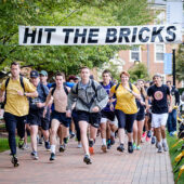 Students participate in Wake Forest University's Hit the Bricks event to raise money for cancer research