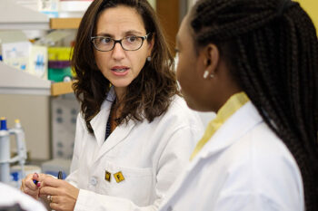 Wake Forest chemistry professor Patricia Dos Santos works with graduate students Ashley Edwards, Maame Addo, and Canna Zheng in her lab at Wake Downtown.