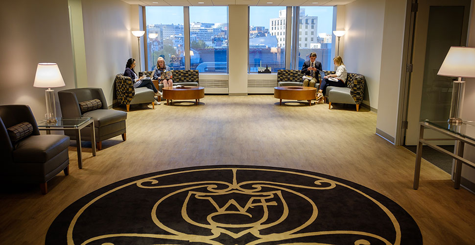 Students meet in the lobby of the Wake Washington Center before class.