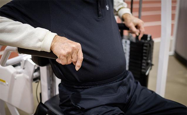 eople lift weights and perform other weight training exercises at the Clinical Research Center, the research location for the Wake Forest Health and Exercise Science department.