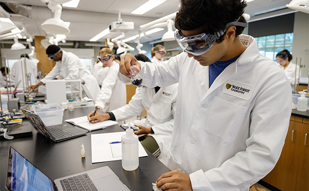 Wake Forest students work on a lab procedure in the general chemistry lab in the newly renovated Salem Hall on Monday, September 10, 2018. First year Zohaib Khawaja ('22) works on his experiment.