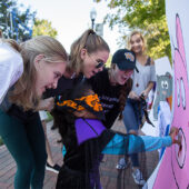 Wake Forest students host local elementary school students on campus for Project Pumpkin, a Halloween celebration, on Wednesday, October 26, 2016.