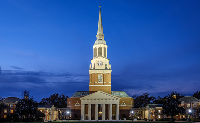 Wait Chapel, on the campus of Wake Forest University, at night.