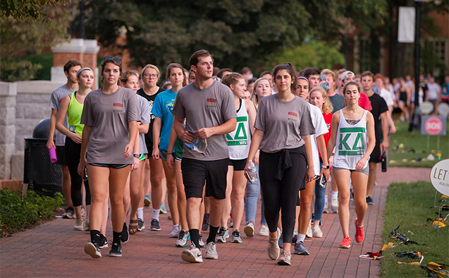 Wake Forest students walk at lap at the 2018 Hit the Bricks event, raising money for cancer research