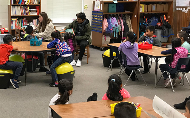 Sixth graders reading in a classroom