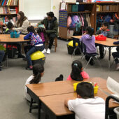 Sixth graders reading in a classroom