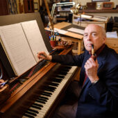 Wake Forest music professor and composer Dan Locklair poses in his studio at his home in Winston-Salem on Monday, July 2, 2018.