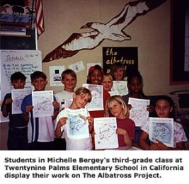 Third-graders at Twentynine Palms Elementary display their work on The Albatross Project