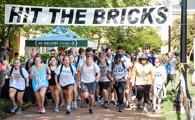 Members of the Wake Forest community run laps around Hearn Plaza to raise money for the Brian Piccolo Fund for cancer research on Thursday, October 4, 2018.