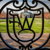 Ironwork frames Hearn Plaza on a warm spring afternoon as students enjoy being outside, on the campus of Wake Forest University, Thursday, March 28, 2019.