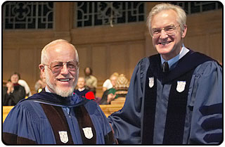 Professor of Biology Peter Weigl (left) receives the Jon Reinhardt Award for Excellence in Teaching from Dean of the College Paul Escott.