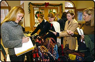  Jennifer Woodsmall, selling her handbags during a campus "trunk show."