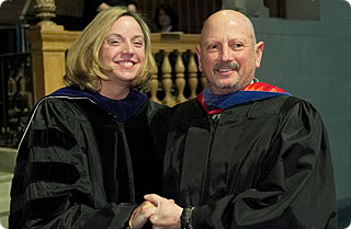 Charles Richman, right, was presented the Donald O. Schoonmaker Faculty Award for Community Service by Deborah Best, dean of the College.