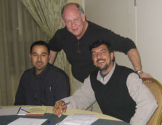 Allan Louden with two seminar attendees in Amman, Jordan.