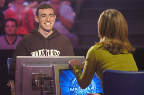 Aaron Mass (left) on "Who Wants To Be A Millionaire"