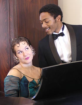 Visiting professor Leah Roy as Judith Bliss and senior Joe Martinez as Richard Greatham