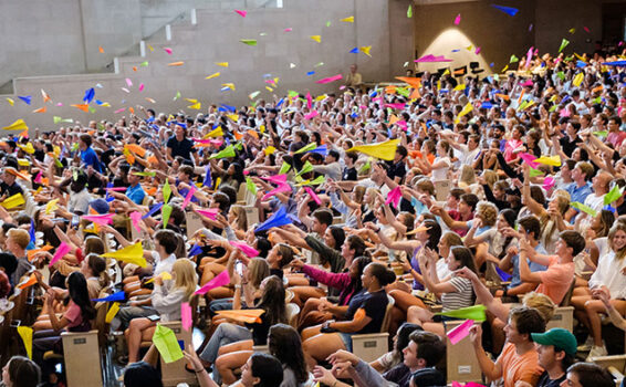 Students throw paper airplanes in Wait Chapel to 'launch' the start of the college-to-career journey at Wake Forest.