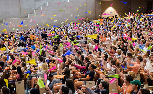 Students throw paper airplanes in Wait Chapel to 'launch' the start of the college-to-career journey at Wake Forest.