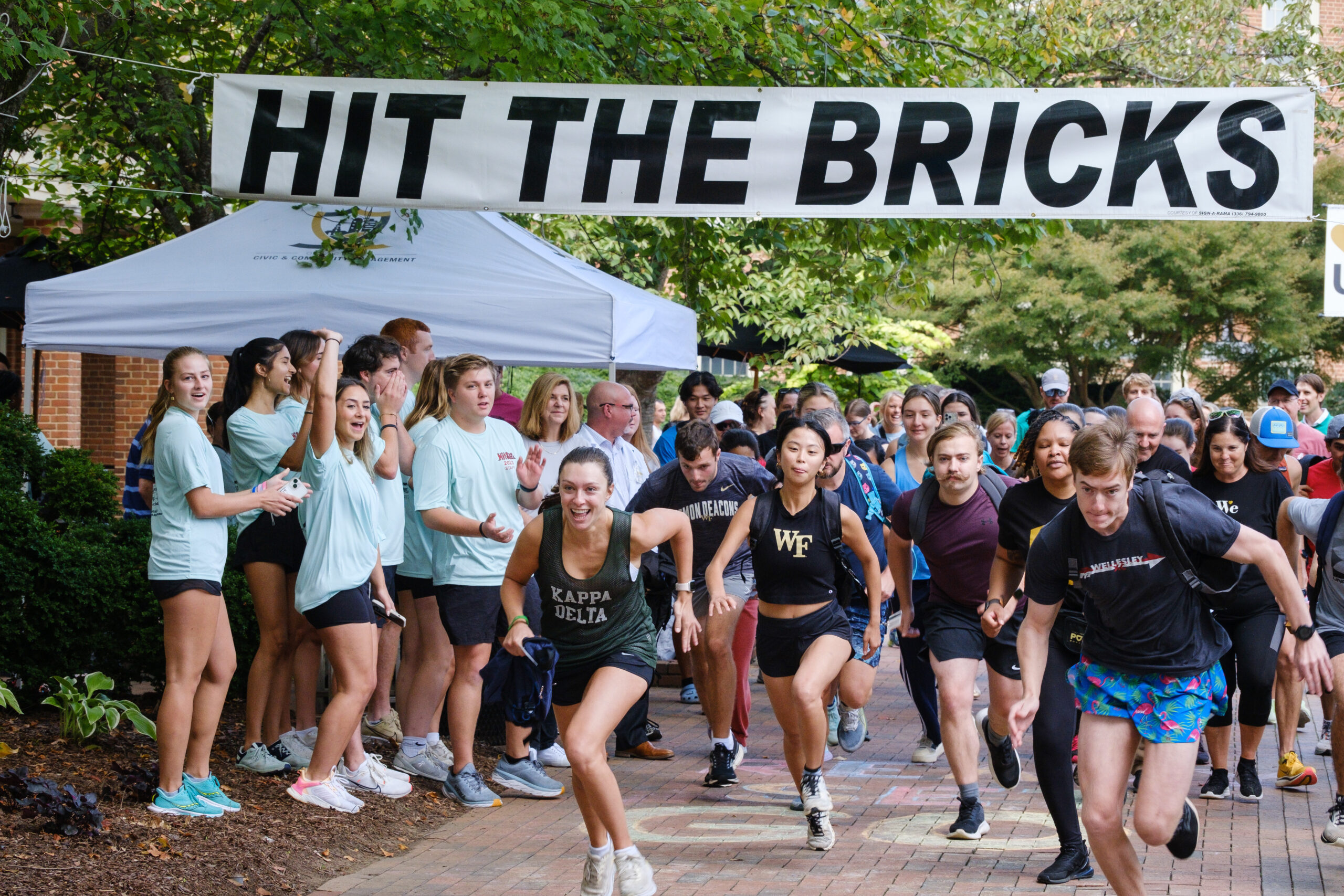 The Wake Forest community runs, walks, and rides laps around Hearn Plaza to raise money for cancer research at the annual Hit the Bricks for Brian event on Thursday, October 5, 2023.