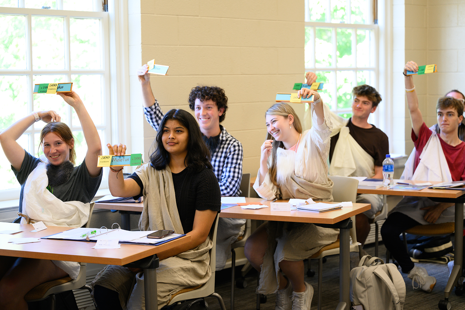 Classical Languages Prof. T.H.M. Gellar-Goad’s first year seminar class, dressed in togas, debates whether Athens should rebuild its military might and empire, during class at Tribble Hall on Monday, October 7, 2024.