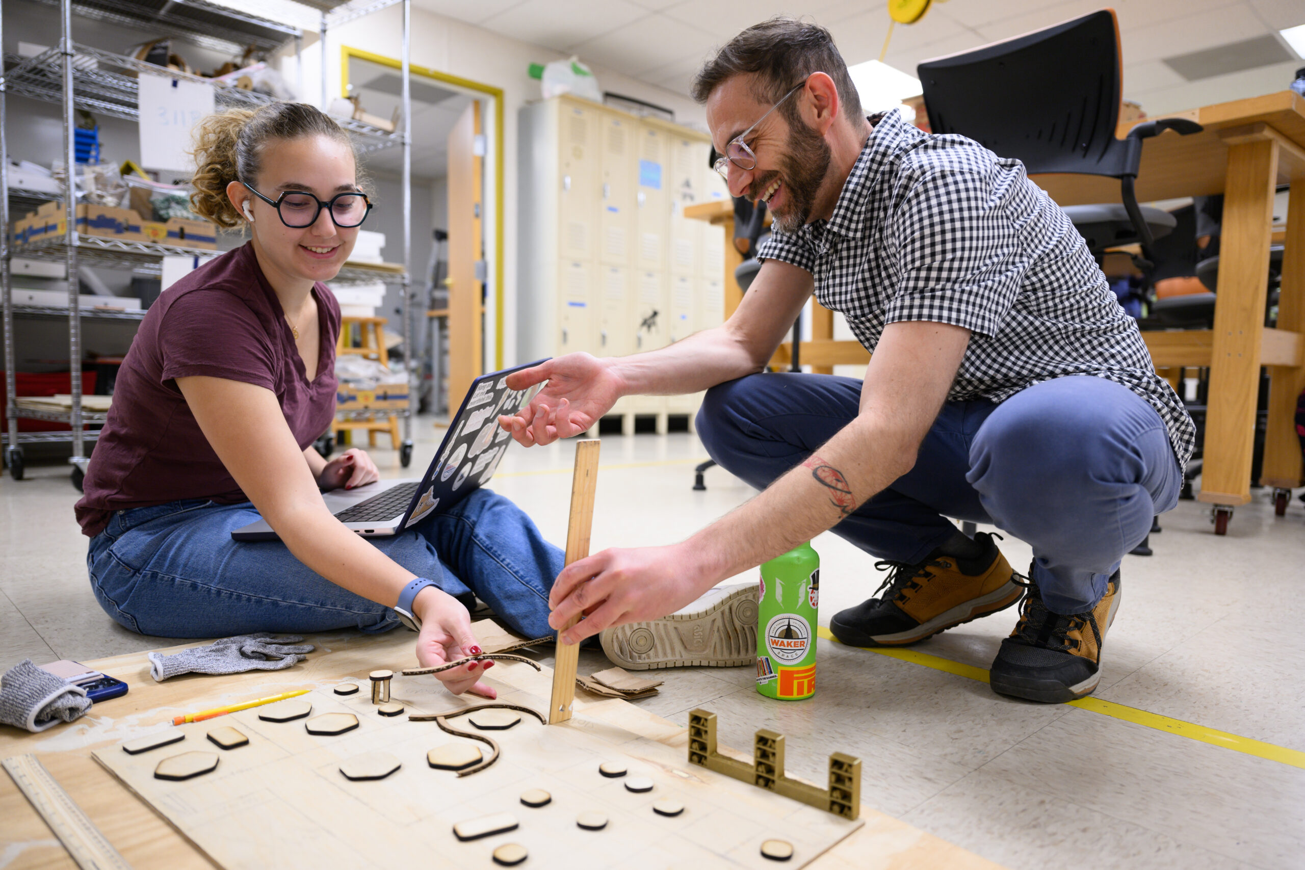 Wake Forest University students from Prof. Ali Sakkal’s Learning and Cognitive Science class work to create models of a classroom using resources at the WakerSpace on Thursday, November 9, 2023.    Prof. Ali Sakkal gives Julia Mascialino (’26) feedback on her model classroom.