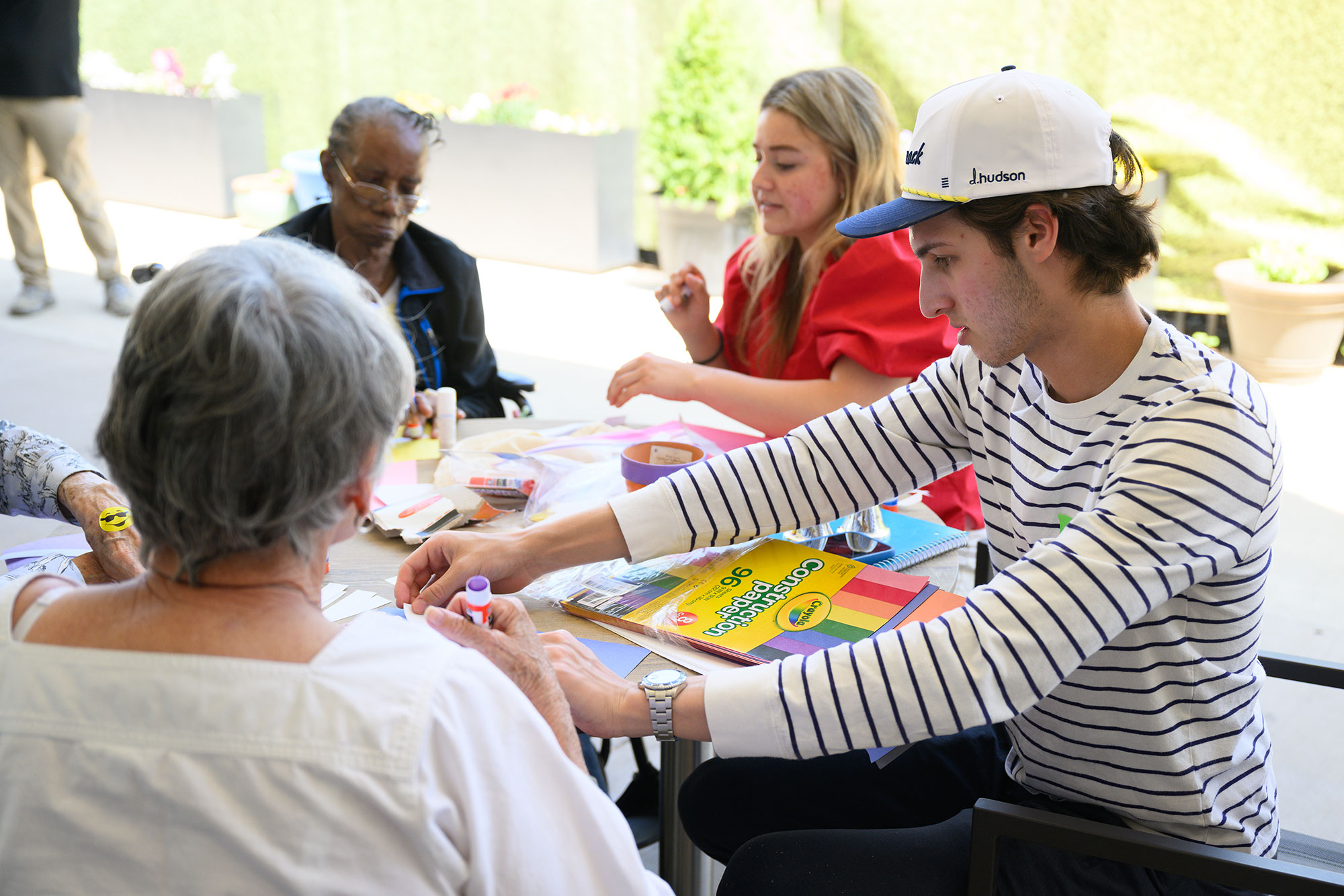 The Creative Care capstone project included writing a spring-themed poem with Williams Center patrons, followed by making a craft.