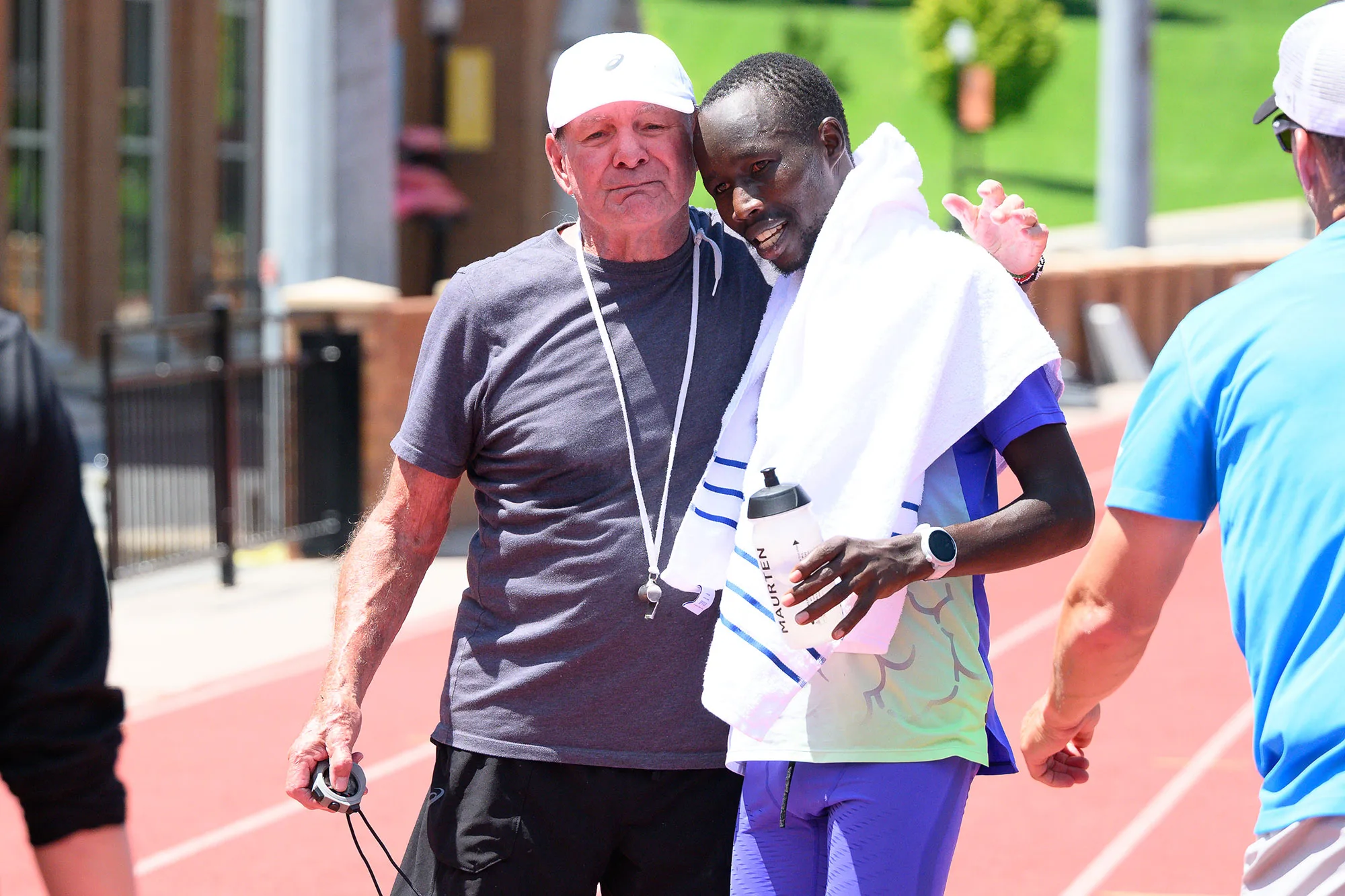 A post-testing moment with elite marathoner John Korir and his coach, Ron Mann.