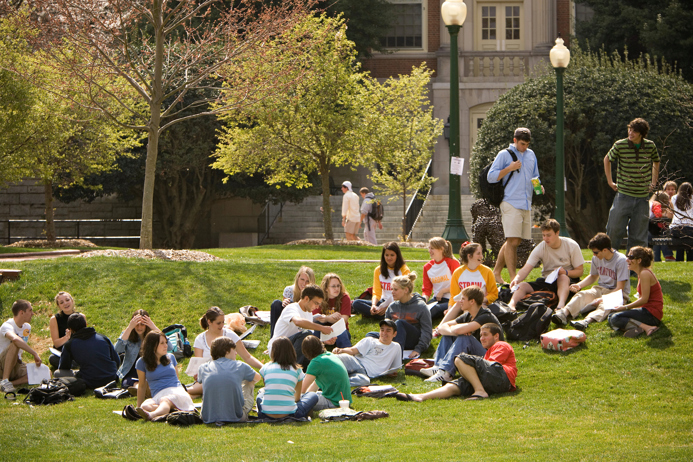 Class meeting on lawn outside Tribble