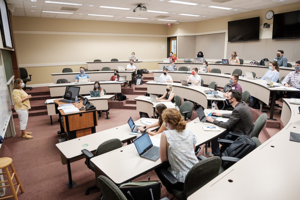 students and teacher in a physically distanced classroom