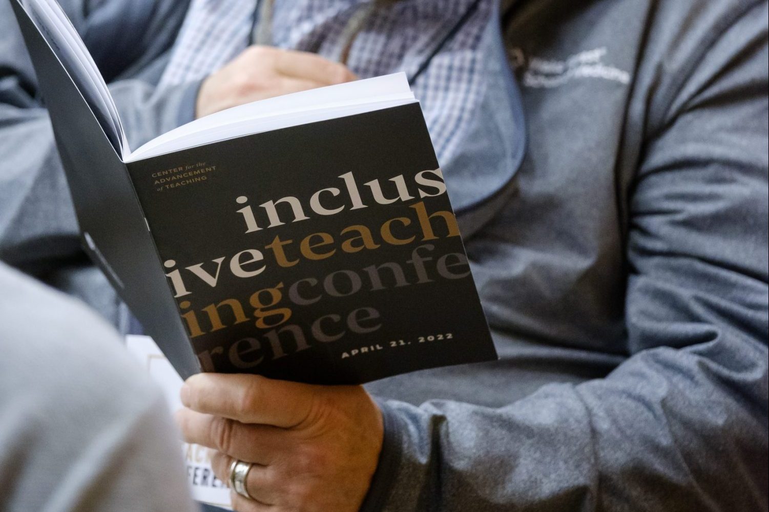 Man reading a program