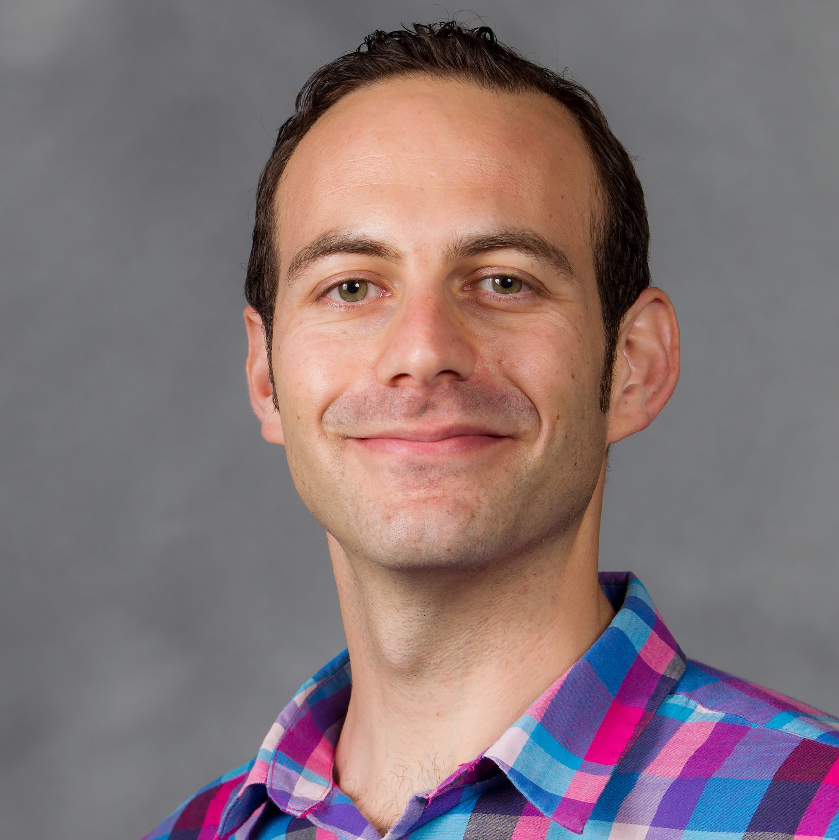 New faculty headshots during orientation, Wednesday, August 14, 2013. Ali Sakkal, Education.