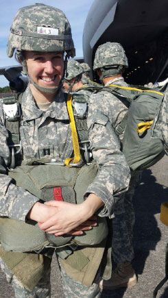 Eleanor “Ellie” Morales (JD ’10) preparing to parachute out of a plane