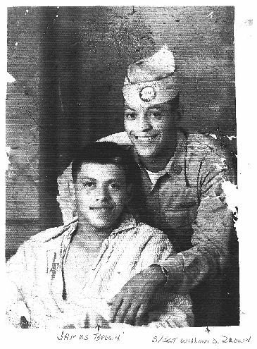 An old photo of James Brown in a military uniform posing with his brother