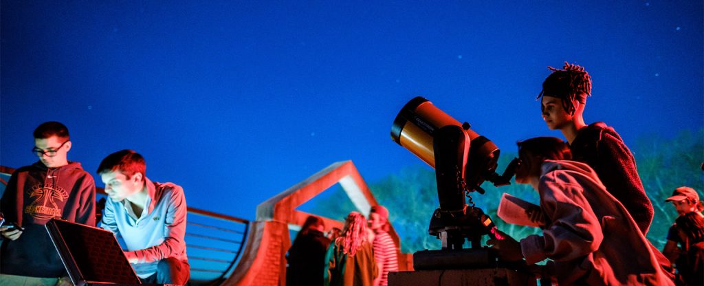 Wake Forest students learn to calculate the diameter of celestial objects using a telescope and basic trigonometry, in their astronomy class in Olin Hall