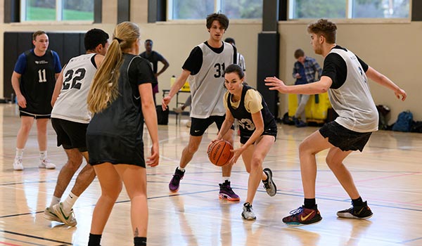 Wake Forest University students play intramural basketball in the Sutton Center.