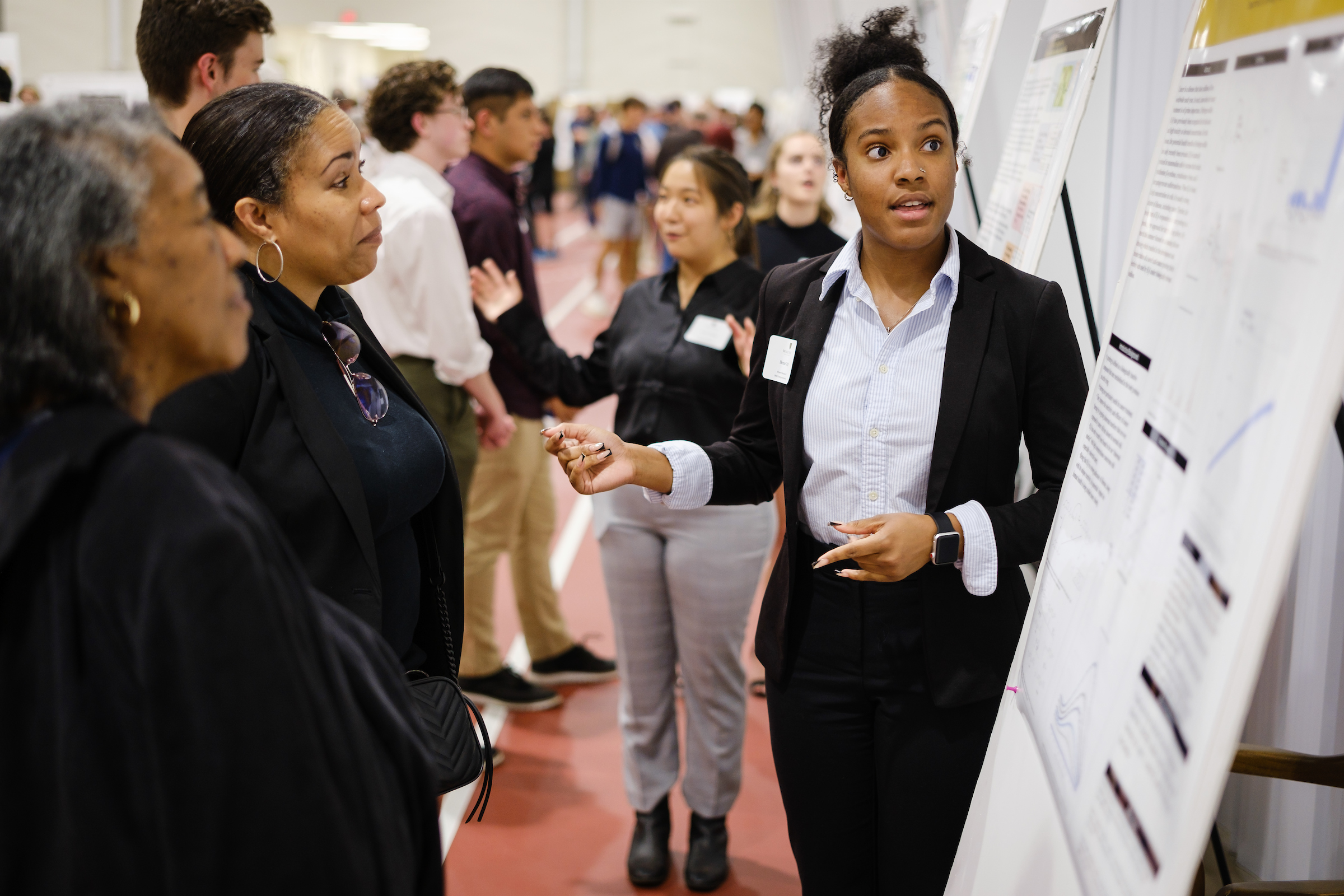 Wake Forest undergraduate students present their research at the Research Day event during Family Weekend, on Friday, October 7, 2022.  Benae Clardy talks about their project.