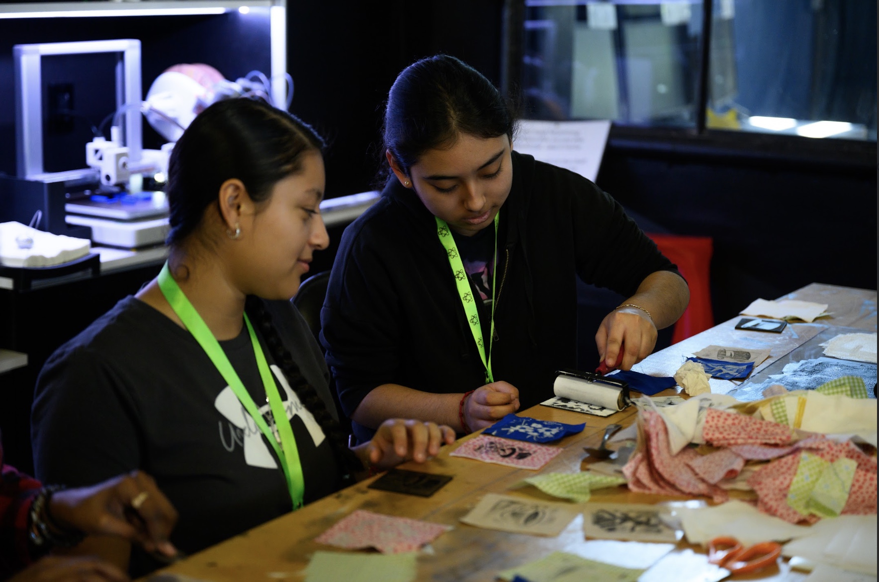 LEAP interns using stamps they made with a laser cutter during field trip to WS Mixxer Community Makerspace. 