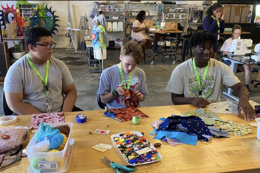 LEAP interns learning to sew during field trip to WS Mixxer Community Makerspace.