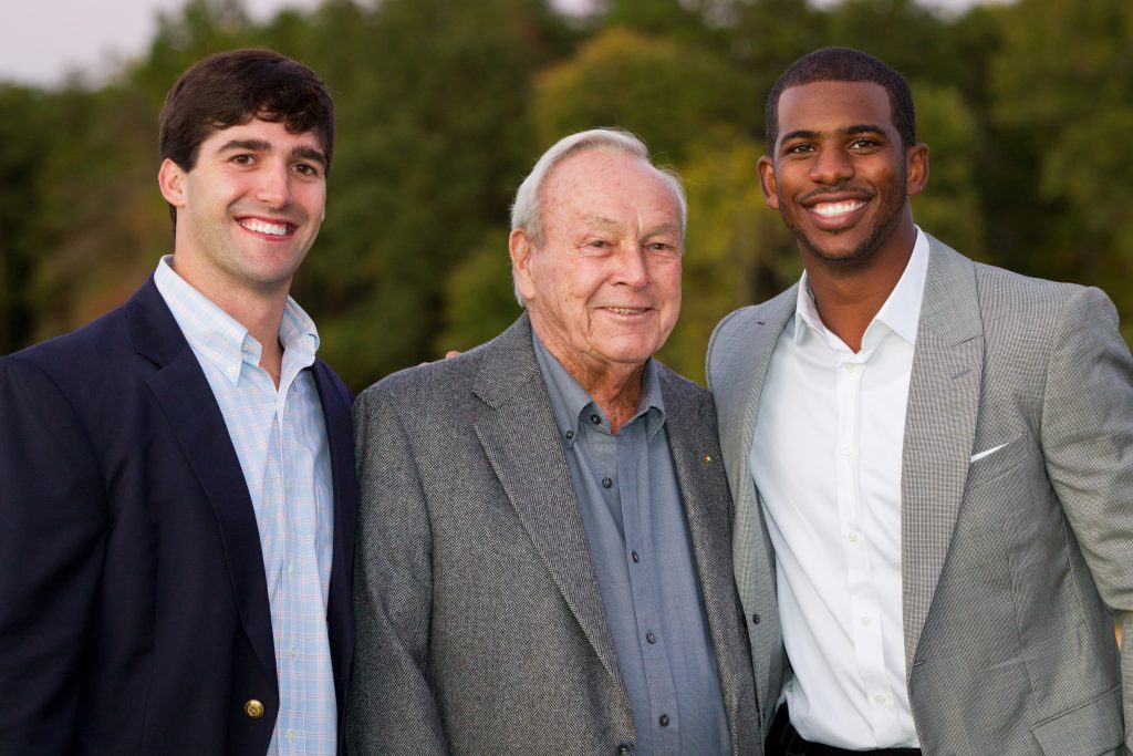 Arnold Palmer (center) posed with two other athletes who starred at Wake Forest, Riley Skinner (left) and Chris Paul, during a 2011 visit to Wake Forest.