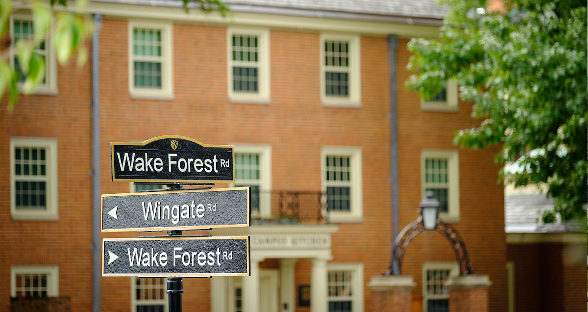 Photo of a road sign indicating Wake Forest Road, 