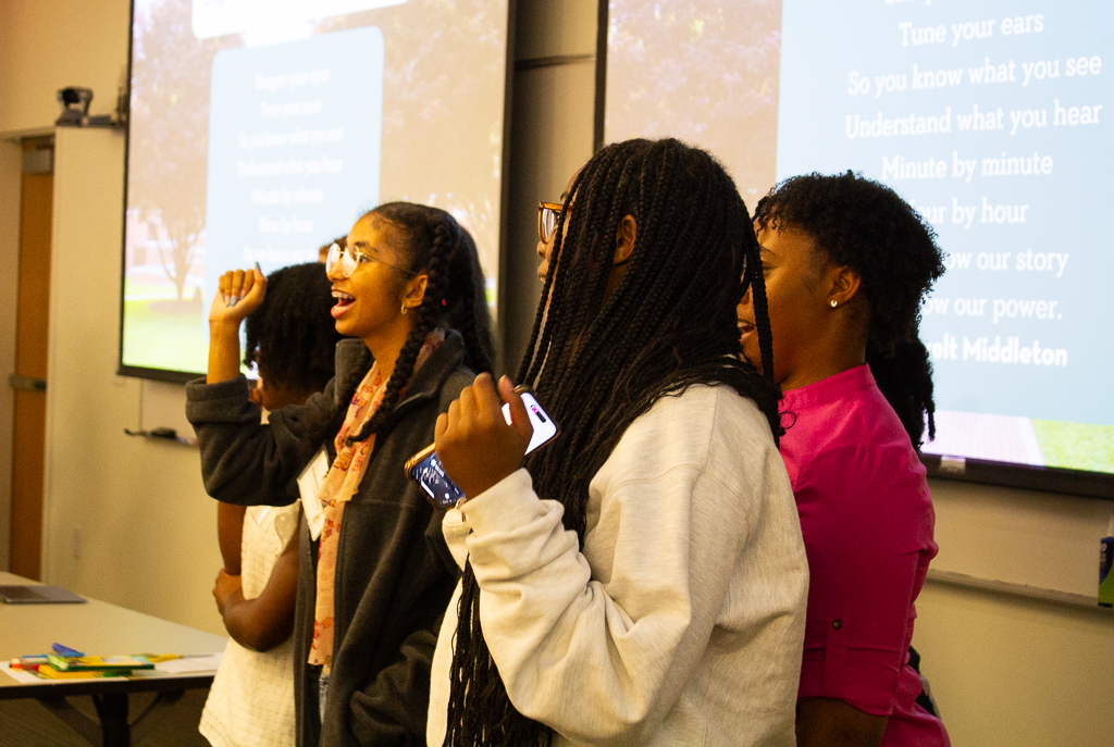 College LAUNCH YLEB members demonstrate the Origin of Things speech during a Saturday Summit.