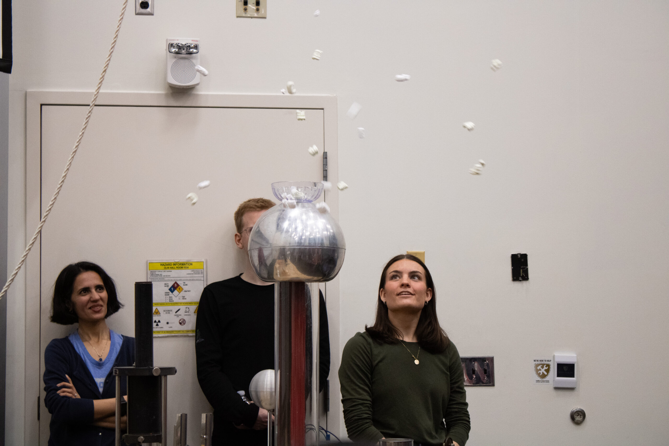 Wake Forest physics graduate student conducts a lab.