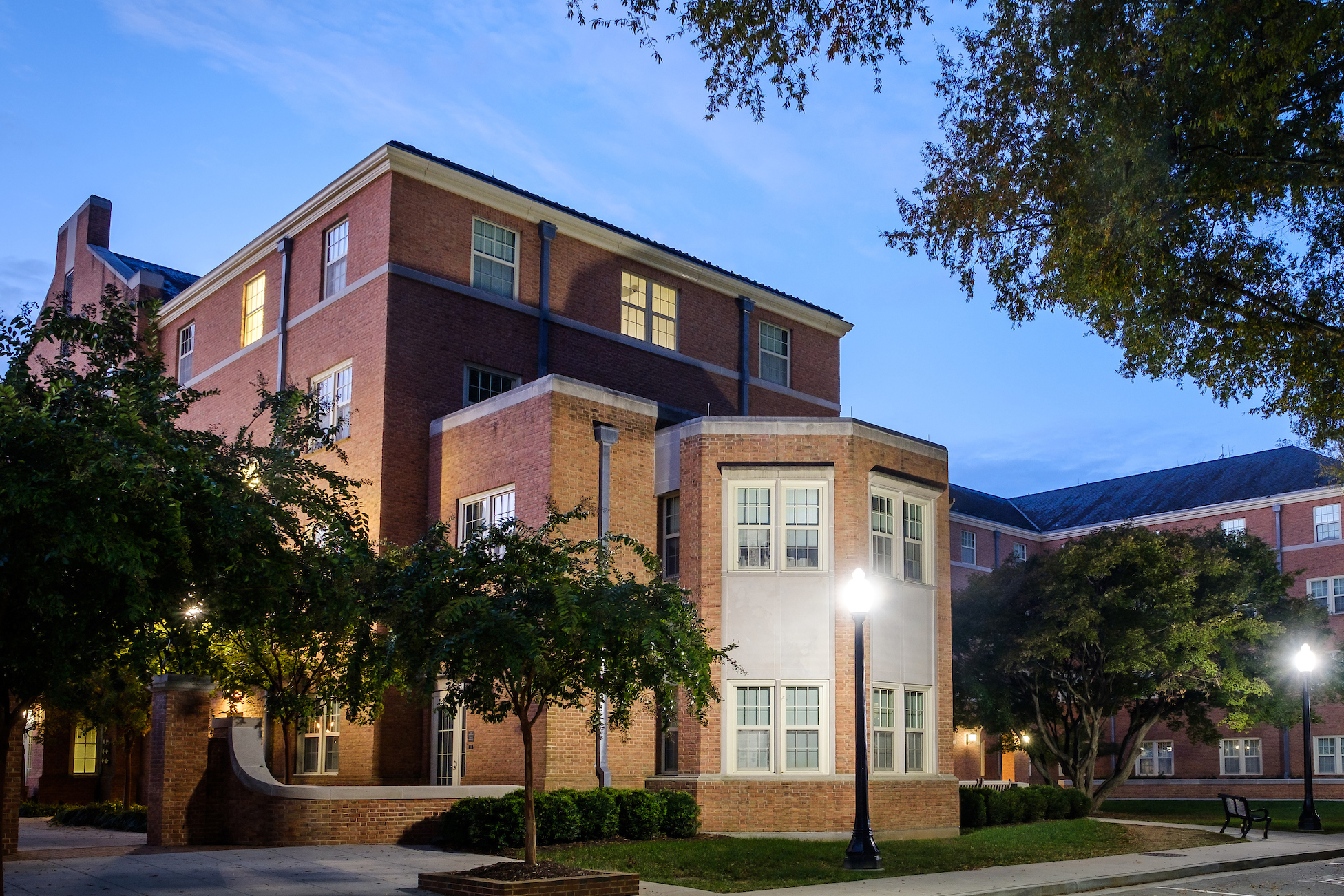 Exterior photo of South Residence Hall at dusk