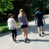 Students Walk Through a Park Near the Flow House in Vienna, Austria