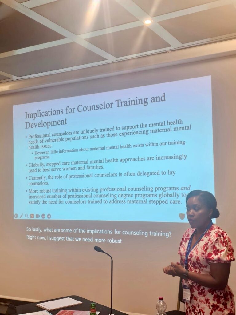Photo of Dr. Jasmine Graham presenting the IAC Conference in Italy in July 2024.