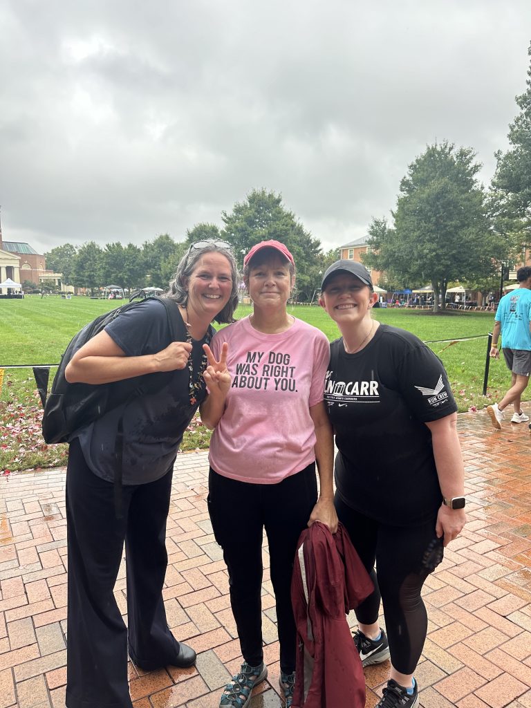 Dr. Sarah Moore, Dr. Tammy Cashwell, and Louisa Steffen at Hit the Bricks.