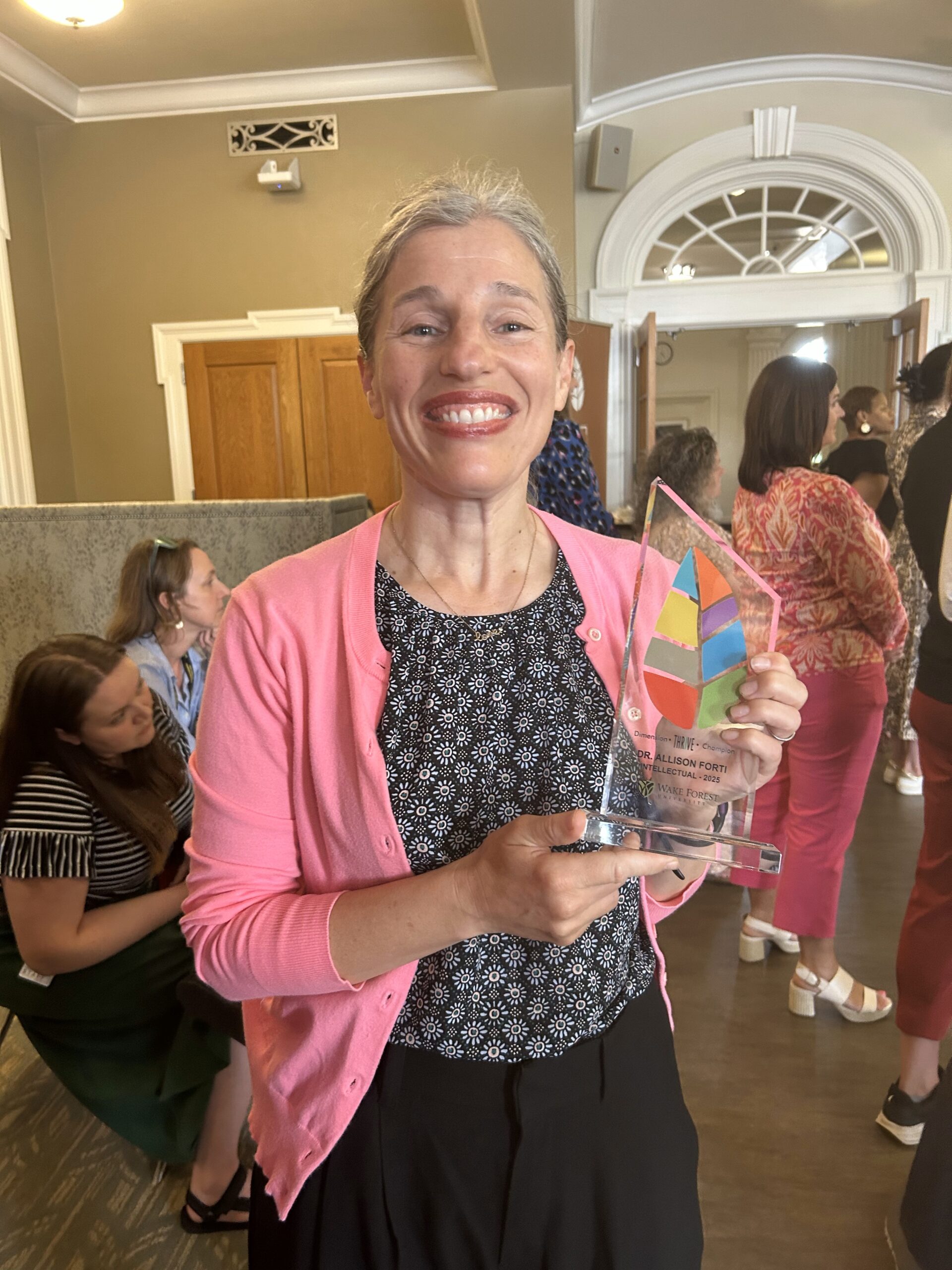 Dr. Alli Forti receives 2025 University Thrive Award.