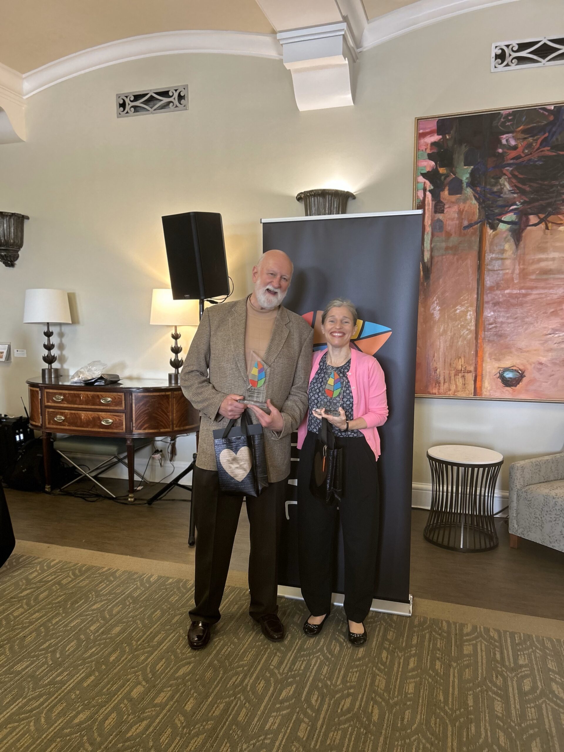 Dr. Bob Nations and Dr. Alli Forti receive 2025 University Thrive Awards.